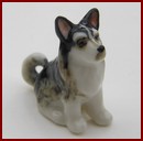 HAK565B Tiny Ceramic Sitting Dog Ornament